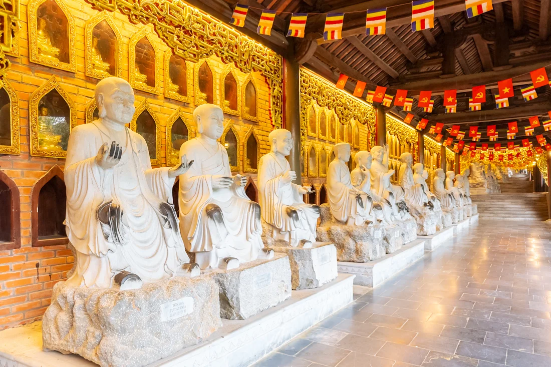 Hallway full of Buddha statues at Bai Dinh Pagoda in Ninh Binh, Vietnam