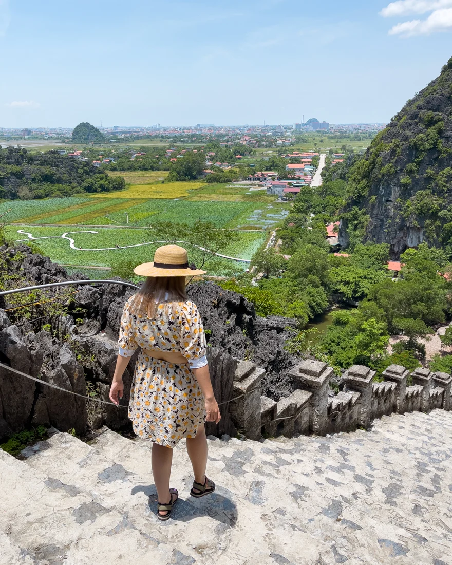 Walking down the stairs at Mua Cave in Ninh Binh, Vietnam.